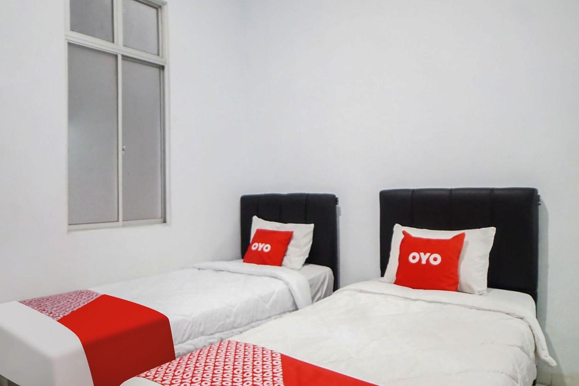 Super Oyo 91627 Wika Wiki Homestay Медан Екстериор снимка